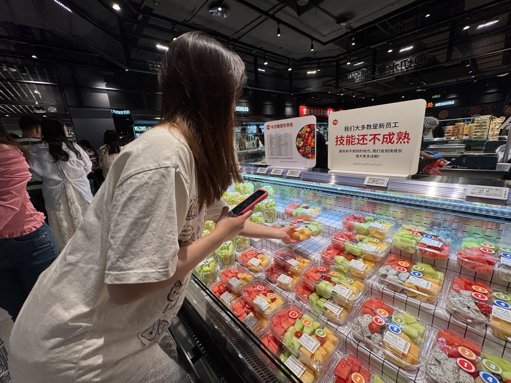 永辉超市重庆万州万达店自主调改开业。受访者供图